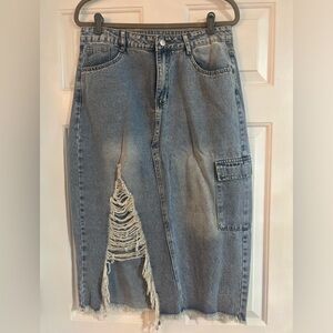 **Gently Used** Denim skirt size large, light blue and white faded wash.